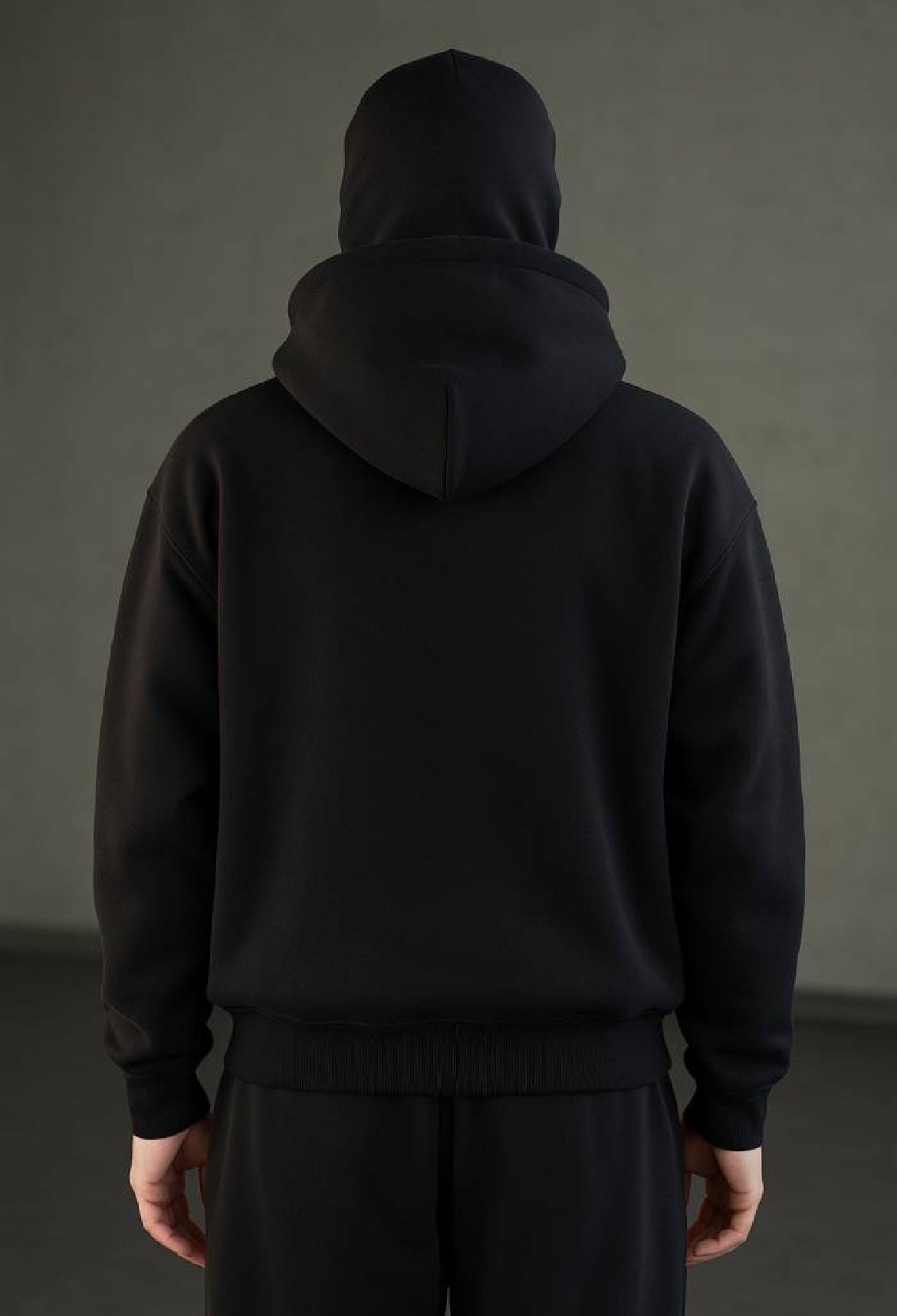 Back view of black full zipper hoodie with hood.
